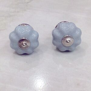 Two Anthro drawer knobs